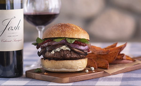 Burger with Grilled Portobellos, Sun-Dried Tomatoes and Blue Cheese Image